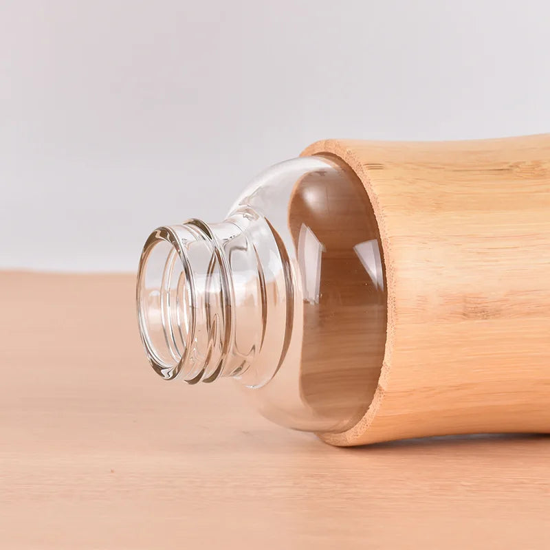 Bouteille d'eau en verre de 500 ml avec bouchon en bambou et manchon résistant à la chaleur