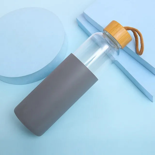 Bouteille d'eau en verre de 500 ml avec manchon en silicone résistant à la chaleur, petite ouverture, portable, étanche, avec poignée